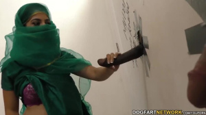 Nadia Ali Has Fun With A Big Black Dick In A Gloryhole